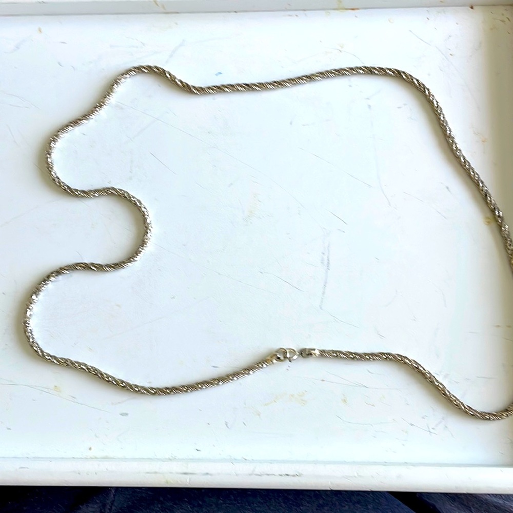 34” silver chain.